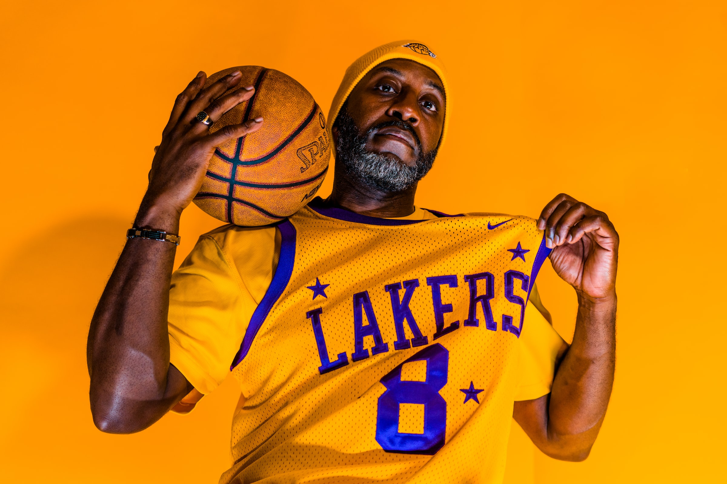 Lakers fan posing with a ball